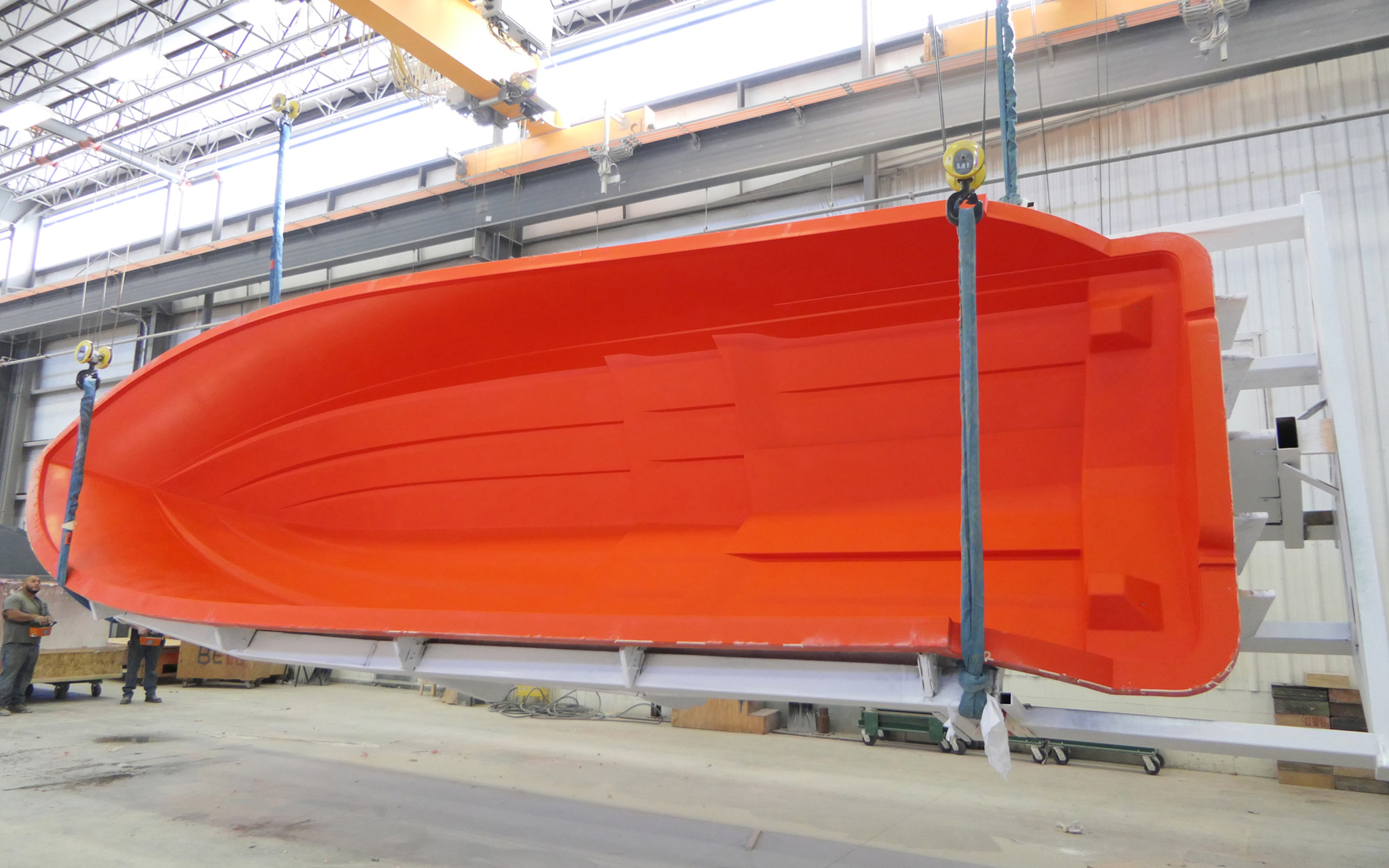 The hull mold is rotated after de-molding