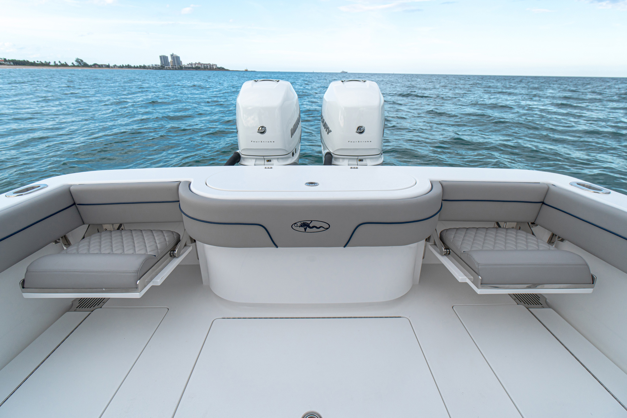 Available GG Schmitt transom seats fold away quickly.