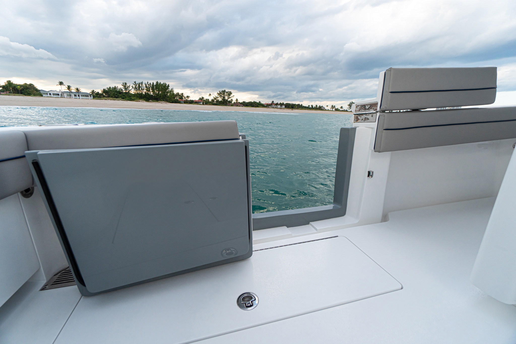 Standard port-side dive door swings inboard for convenience and safety.