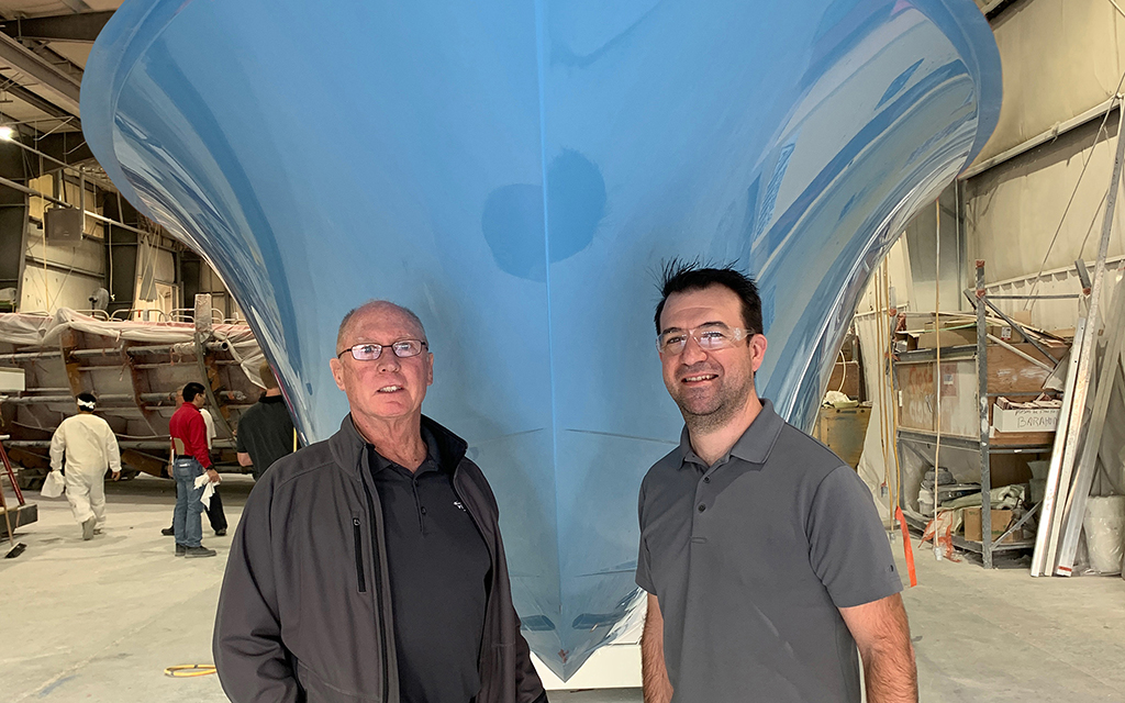Engineers Bill Heller (left) and Bill Hall with hull No. 1